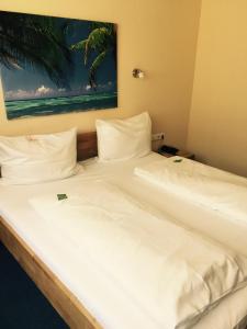 Tempat tidur dalam kamar di Hotel Gerber