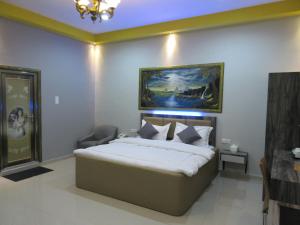 Voodi või voodid majutusasutuse Hotel 01 Batam toas