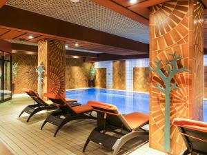 La alberca dentro o cerca de Le Royal Hotels & Resorts Luxembourg