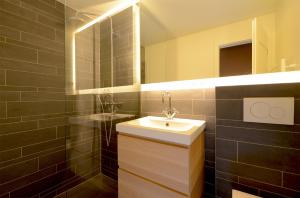 A bathroom at Wenningstedt Beach Apartment