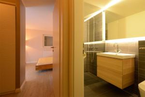 A bathroom at Wenningstedt Beach Apartment