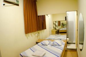 Voodi või voodid majutusasutuse Hotel Ordenes (Adult Only) toas