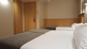 A bed or beds in a room at Espel