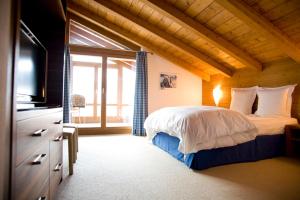 Cama ou camas em um quarto em Chalet Panorama