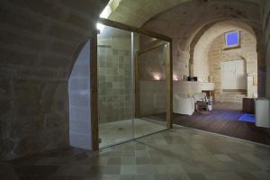 Ванная комната в Antico Convicino Rooms Suites & SPA