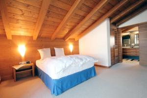 Cama ou camas em um quarto em Chalet Panorama