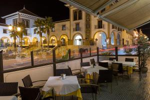 Un restaurant u otro lugar para comer en Hotel La Pinta