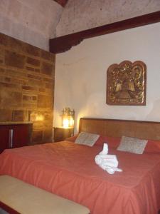 מיטה או מיטות בחדר ב-Flying Dog Hostel Arequipa