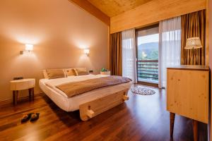 Lova arba lovos apgyvendinimo įstaigoje Bohinj Eco Hotel