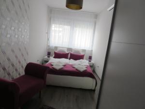 Krevet ili kreveti u jedinici u okviru objekta Szofi Apartman