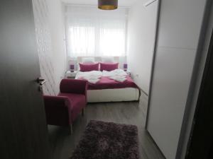 Krevet ili kreveti u jedinici u okviru objekta Szofi Apartman