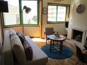 A seating area at Porto 1 Bedroom Beach Apartment