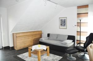 Гостиная зона в Komfortable Apartment-Wohnung