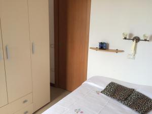 Cama ou camas em um quarto em Appartamento Green Tuscany