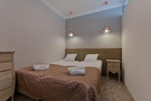 Giường trong phòng chung tại Apartamenty Gdańsk EU - Sopot Apartamenty