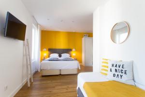 Krevet ili kreveti u jedinici u okviru objekta Aveiro Rossio Bed & Breakfast