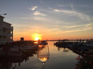 The sunrise or sunset as seen from a vendégházakat or nearby