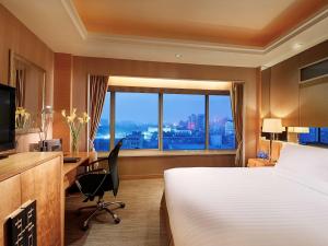 Cama ou camas em um quarto em Sofitel Xi'an On Renmin Square