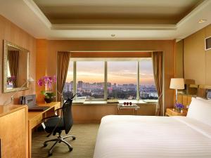 Cama ou camas em um quarto em Sofitel Xi'an On Renmin Square