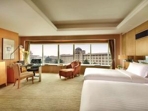 Cama ou camas em um quarto em Sofitel Xi'an On Renmin Square