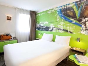 Katil atau katil-katil dalam bilik di Ibis Styles Lyon Villeurbanne Parc de la Tête d'Or