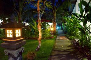 Sodas prie apgyvendinimo įstaigos Palm Garden Bali