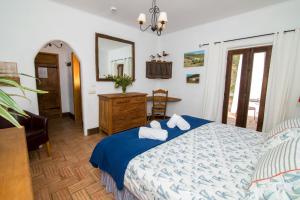 A bed or beds in a room at Casa Fajara