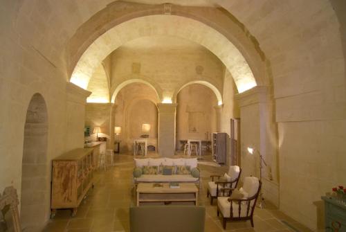 A seating area at L'Hotel In Pietra