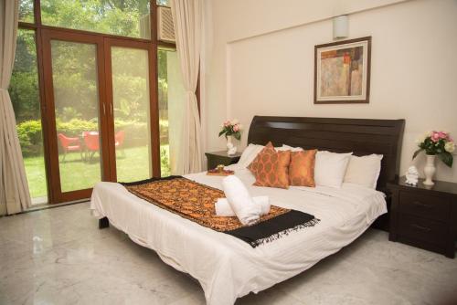 Легло или легла в стая в Hermitage Suites Koregaon Park Garden & Terrace Room