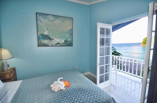 Tempat tidur dalam kamar di Moon San Villa at the Blue Lagoon