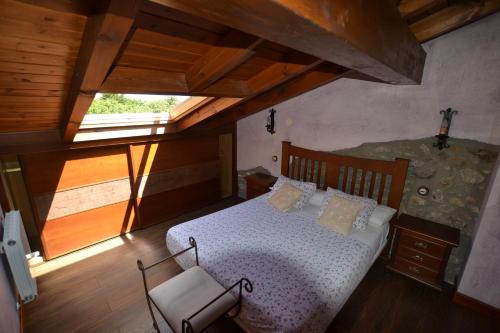 Een bed of bedden in een kamer bij La Casona del Carmen