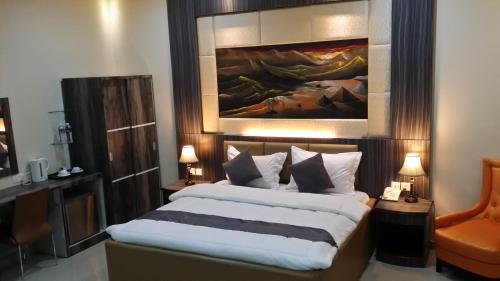 Voodi või voodid majutusasutuse Hotel 01 Batam toas