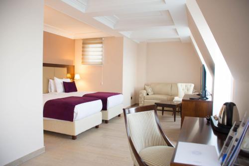 Cama ou camas em um quarto em Xenon Hotel & SPA