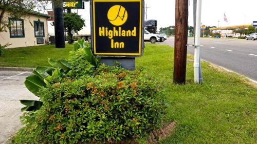 Un certificado, premio, letrero u otro documento en Highland Inn Denham Springs Baton Rouge East