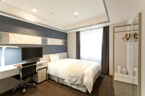 Cama ou camas em um quarto em Hotel Tokyo Garden Palace