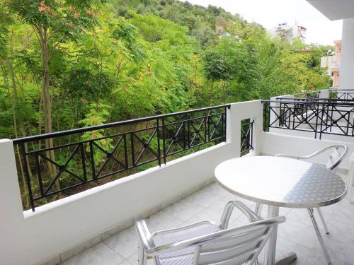 A balcony or terrace at Pagona Hotel