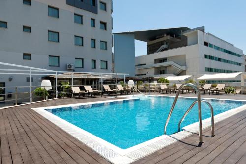 Piscine de l'établissement Hotel Sevilla Center ou située à proximité