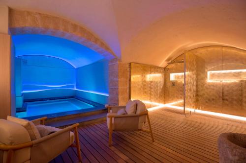 The swimming pool at or close to Convent de la Missio - Grand Luxury Boutique hotel, Adults Only