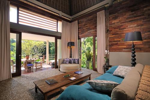 Гостиная зона в The Purist Villas & Spa Ubud