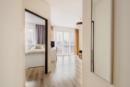 Krevet ili kreveti u jedinici u okviru objekta Apartament Poniatowskiego - Komfortowe Noclegi