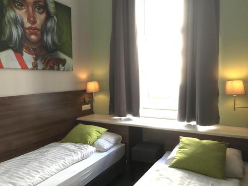 Vuode tai vuoteita majoituspaikassa Urban Stay Salzburg City