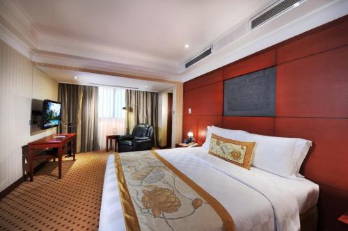 Rúm í herbergi á Hotel Borobudur Jakarta