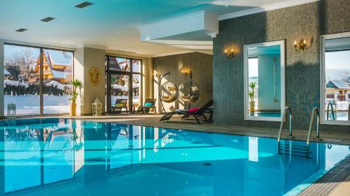 Басейн в или близо до Hotel Paryski Art & Business Zakopane - Basen Jacuzzi Sauna Małpi Gaj