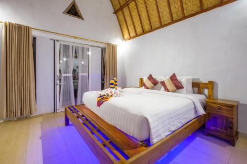 Uma cama ou camas num quarto em Crystal Bay Bungalows