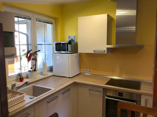 Una cocina o kitchenette en Perfect Apartma