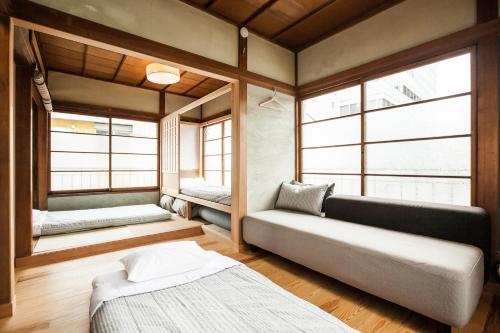 Säng eller sängar i ett rum på Araiya Tokyo -Private Townhouse-