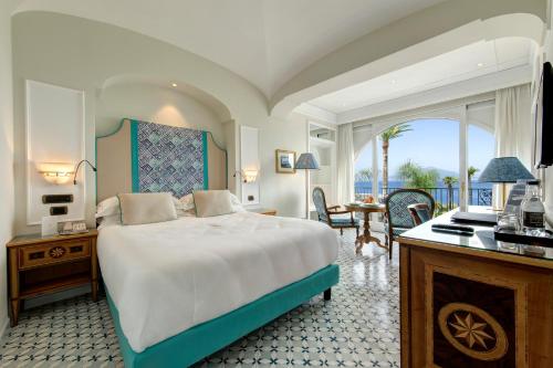 Cama ou camas em um quarto em Grand Hotel Royal