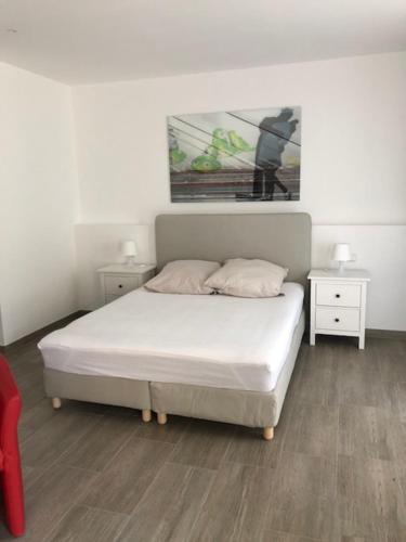 Cama ou camas em um quarto em Wassersport-Appartements am Stößensee