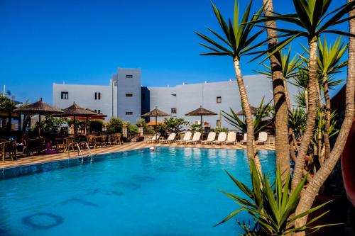 The swimming pool at or close to Corali Studios & Portobello Apartments