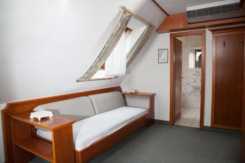 Tempat tidur dalam kamar di Hotel Zeller Zehnt